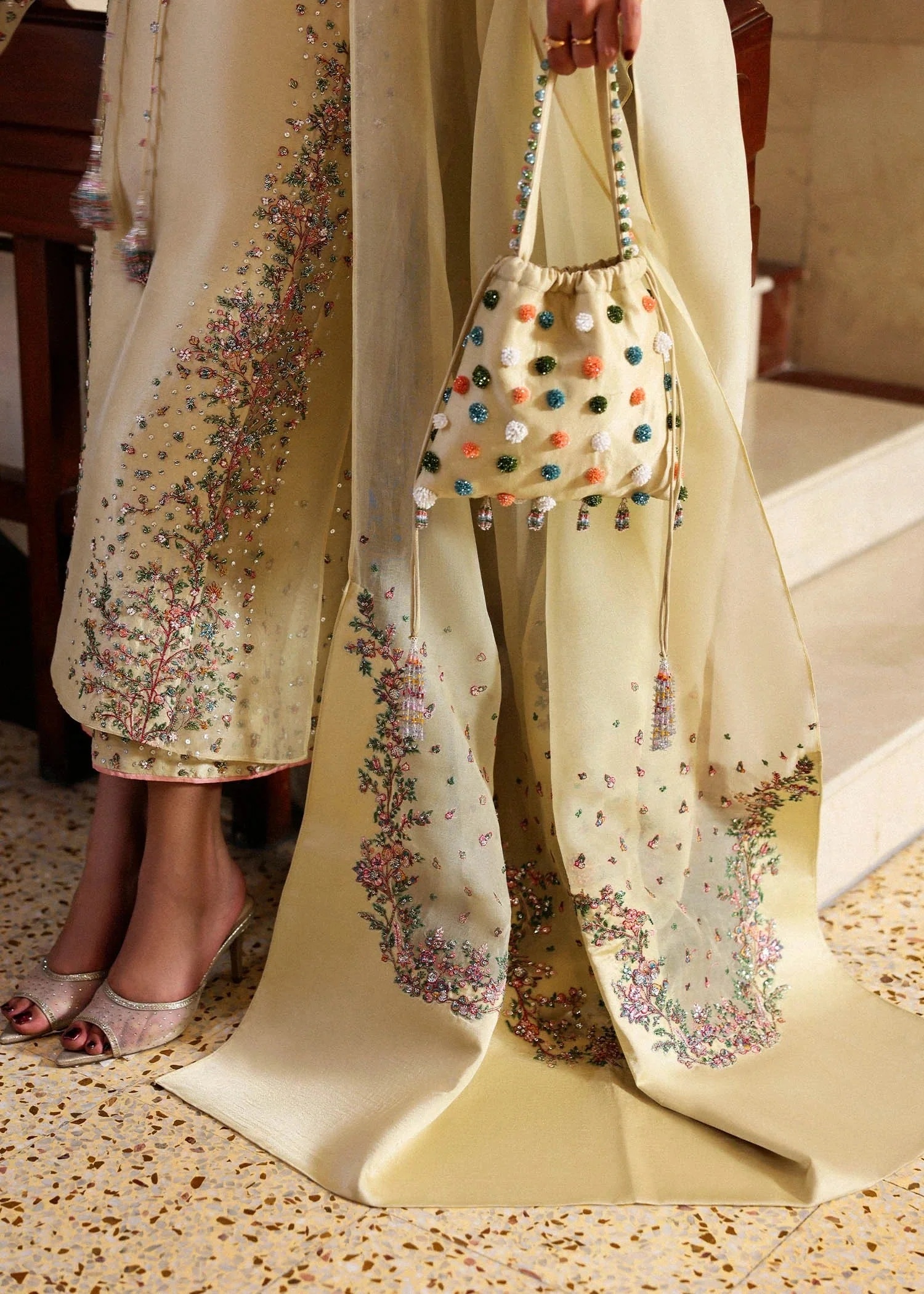 Ciel- Hussain Rehar clothing in yellow, pink tones.